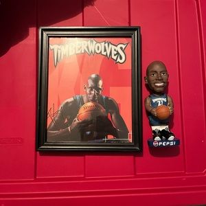 Signed Kevin Garnett picture, frame not included.Along with a bobble head of him